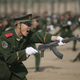 Paramilitary policemen take part in a drill at a military base in Yinchuan, China on Apr. 16, 2009.